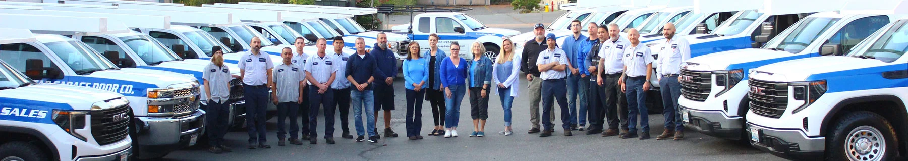company photo with branded trucks